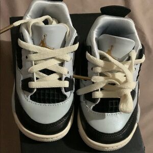 Kids Black and White Sneakers with Gold Accents